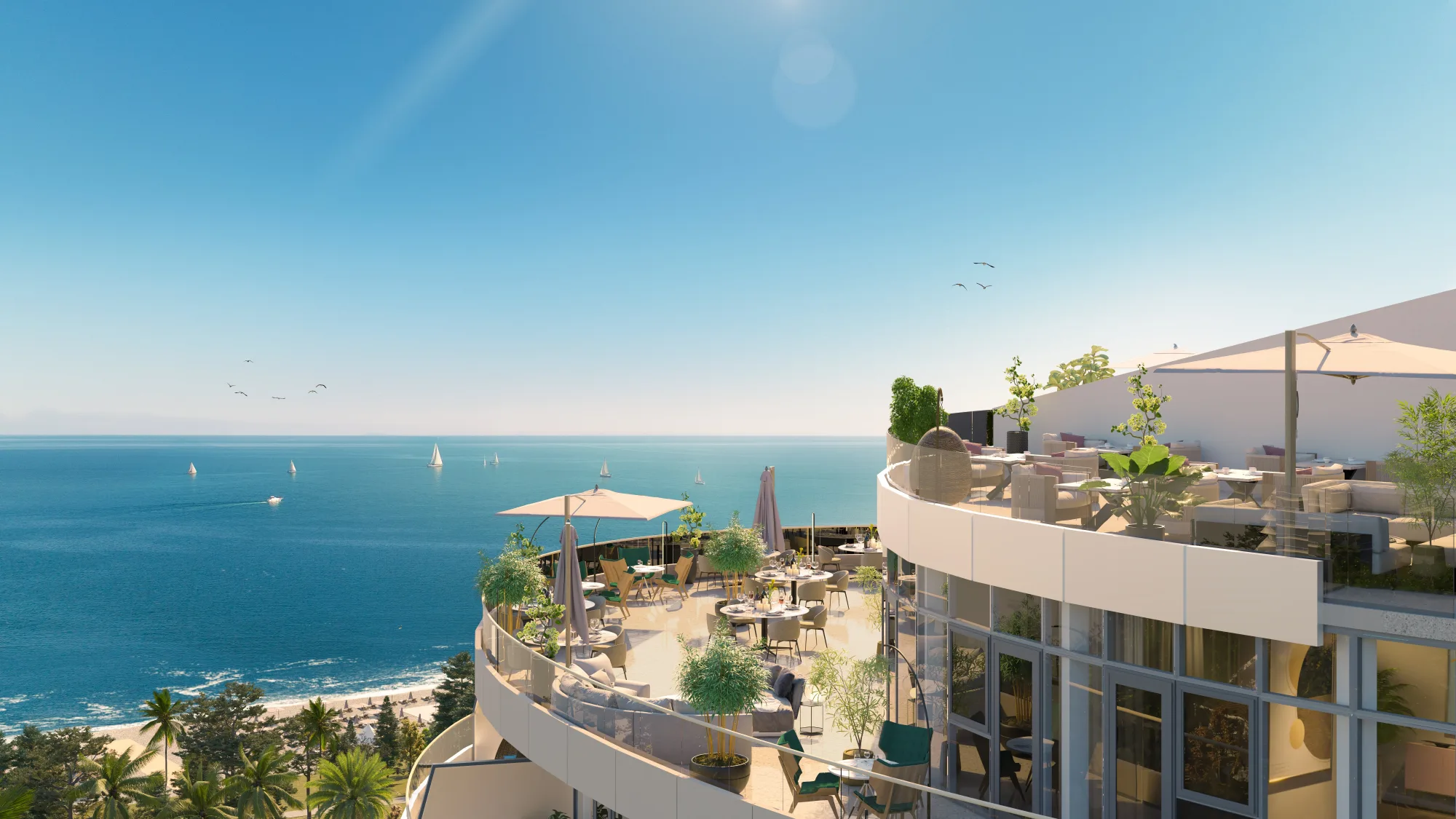 Semira Atrium rooftop terrace at sunset overlooking the sea